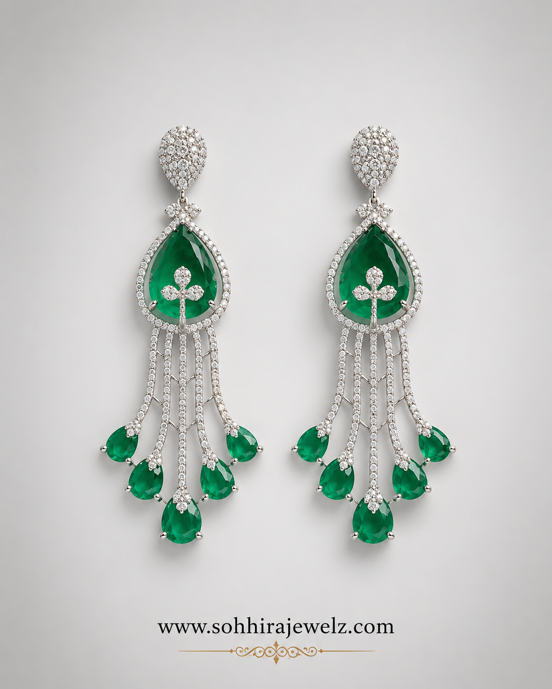 Emerald Cascade Diamond Chandelier Earrings White Gold product flat lay on white background
