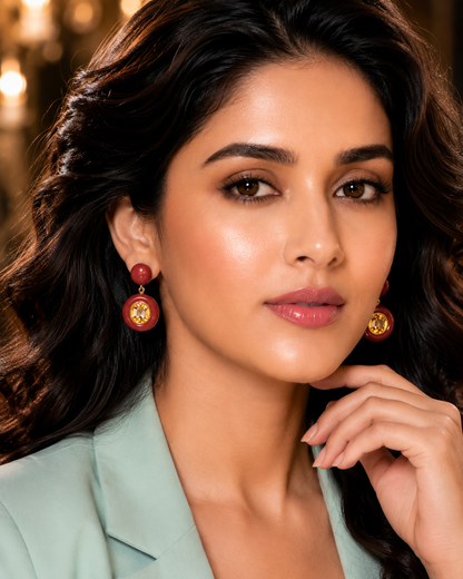Model wearing Crimson Enamel Citrine Drop Earrings with mint blazer - extreme close up face view