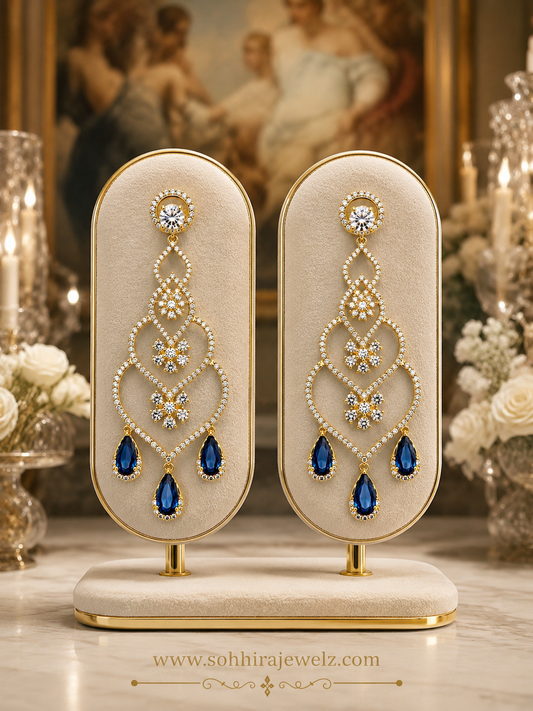 Royal Sapphire Diamond Chandelier Earrings on luxury display stand