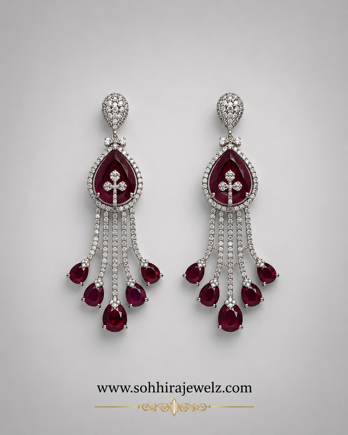 Model wearing Ruby Cascade Diamond Chandelier Earrings with ivory chikankari - close up front view