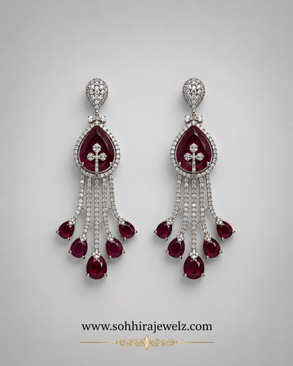 Model wearing Ruby Cascade Diamond Chandelier Earrings with ivory chikankari - close up front view