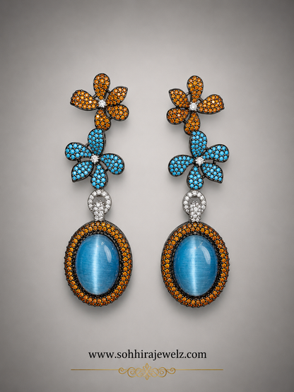 Azure Bloom Cat's Eye Drop Earrings product flat lay on grey background