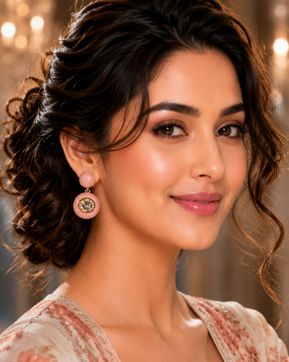 Model wearing Blush Pink Enamel Crystal Drop Earrings with peach floral outfit - side profile close up