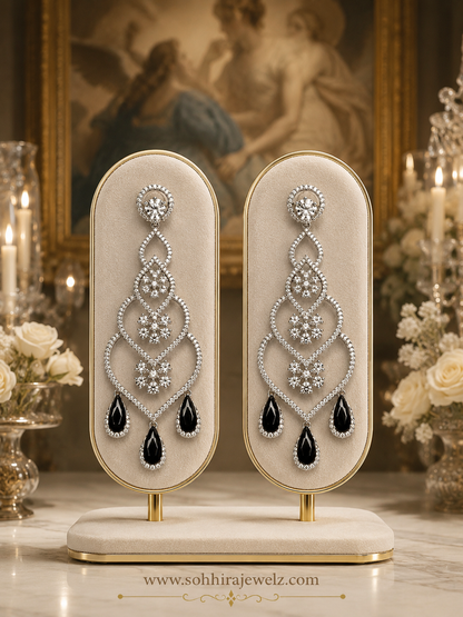 Midnight Noir Diamond Chandelier Earrings on luxury display stand