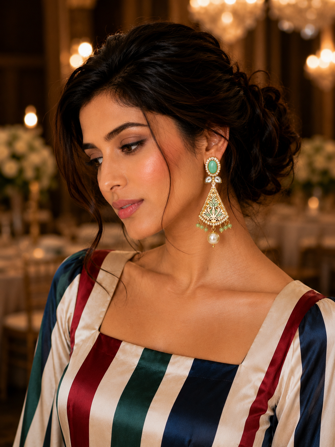 Model wearing Noorjahan Turquoise Meenakari Pearl Drop Earrings at candlelit gala - side profile